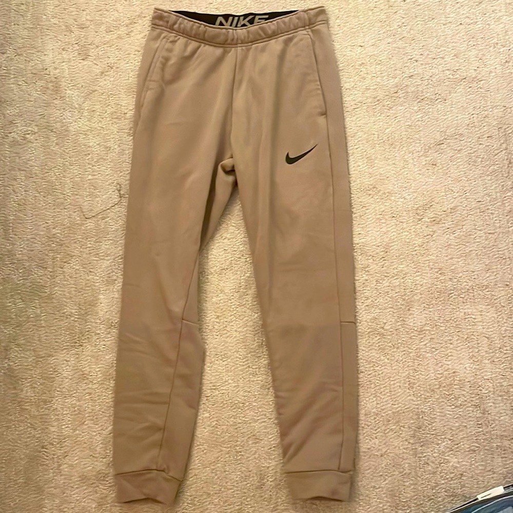 The brand is Nike size small